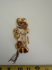 VINTAGE ASIAN BROOCH WITH CARVED FACE AND JEWLEL SIGNED