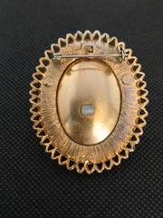 DENISE 195Os goldtone applied bow large faceted orange glass stone brooch