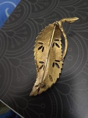 vintage BSK brooch, featuring a gold-toned, textured leaf 1950s to the 1970s