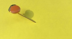 A Happy Vintage Orange Stickpin