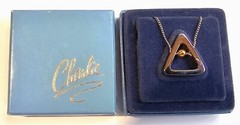 The Charlie Triangle Silver Tone Pendant Charm by Revlon Original Box Never Used