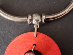 Aarikka Finland necklace with a vibrant red wooden ring pendant