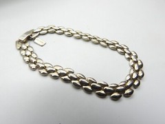 Signed Revlon Gold Tone Metal Train Track Bracelet Vintage