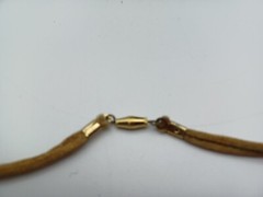 Glass Bead Necklace On Knotted Rope.