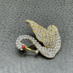 Vintage Swan Brooch Gold Tone Clear Rhinestone Bird Pin Red Eye Costume Jewelry