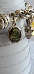 Vintage Avon Multiple Charm Silvertone Stretchable Locket Bracelet 8+