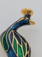 Vintage Peacock Brooch with enamel work and gold-tone accents.