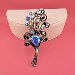 Vintage Rhinestone Brooch Aqua Blue Aurora Borealis Floral Bouquet Pot Metal?