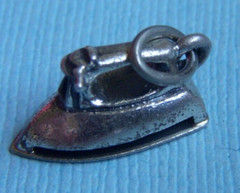Vintage Beau iron sterling charm