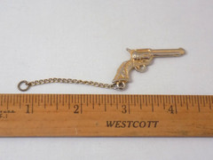 Vintage 1940s 1 3/4 Inch Gold Tone Six Shooter Charm On Two Inch Chain