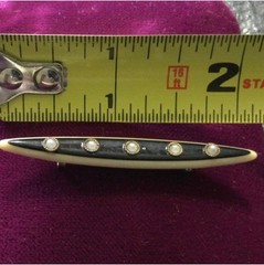 vintage celluloid bar pin with pearl look insets. Est. from the 1930-1940’s