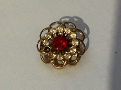 Old, vintage gold tone rhinestone brooch