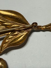 Vintage flower brooch gold tone C Clasp stamped brass red stones prong set