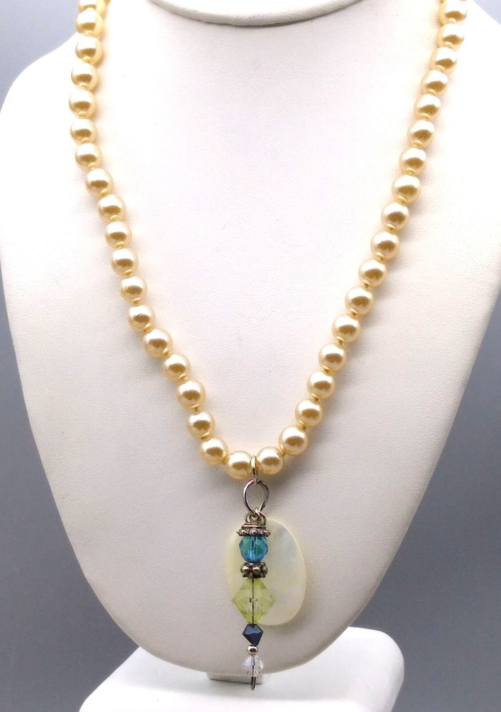 Crystal and Mother of Pearl Pendants on Lustrous Knotted Glass Pearl Strand