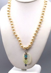 Crystal and Mother of Pearl Pendants on Lustrous Knotted Glass Pearl Strand