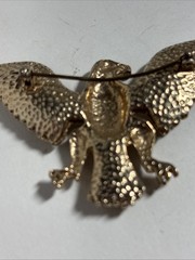Vintage eagle brooch 1.5 Inches X 2 Inches Gold Colored With Red White And Blue