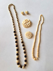 Vintage Carved Necklaces Earrings And Old Brooches.