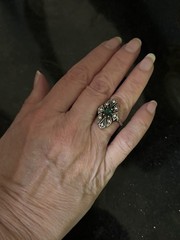Antique ring with unknown dark teal marquis shaped stone And Clear Round Stones