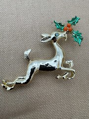 Vintage Gold Tone Leaping Doe Reindeer Christmas Brooch Holly Green Eye