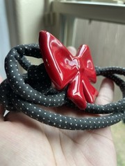 Vintage flying colors signed ceramic red bow Black Cord necklace