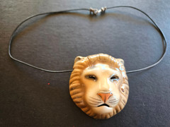 Vintage Ceramic Lion’s Head pendant necklace on 18″ black cord