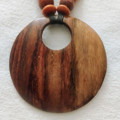 23″ wood bead necklace with 2 3/4 wood doughnut pendent bead and loop clasp MS5