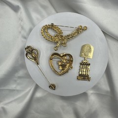Three Mixed Vtg Gold Toned Brooches and One Pon.See pics.