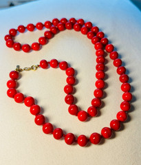 Vintage MONET 32” Red Glass Knotted Bead Necklace