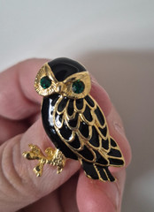 Cute, vintage owl brooch with black enamel and green rhinestone eyes