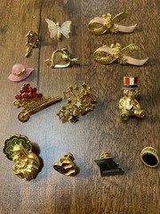 Vintage Lot Of 13 Marked Avon Brooches Pins Gold Tone Various Subjects NICE!