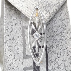 Antique Edwardian platinum Old European diamond brooch/lapel pin. By Krementz.