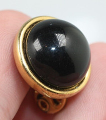 Vintage gold tone black cabochon small push back clip on Monet earrings