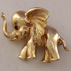 Vintage 14k Elephant Brooch with Red Eyes. High Polish and Textured. 4.8 Grams.