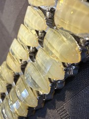 Vintage with an expandable Lucite bracelet in great condition. 1.5″ wide