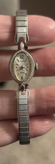 Vintage Ladies Wristwatch Silver Toned Metal Stretch Bracelet With Oval Face 10k