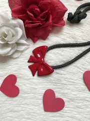 Vintage flying colors signed ceramic red bow Black Cord necklace