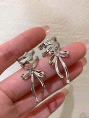 Silver Clip On Bow Earrings with Pink Diamond Centered Piece