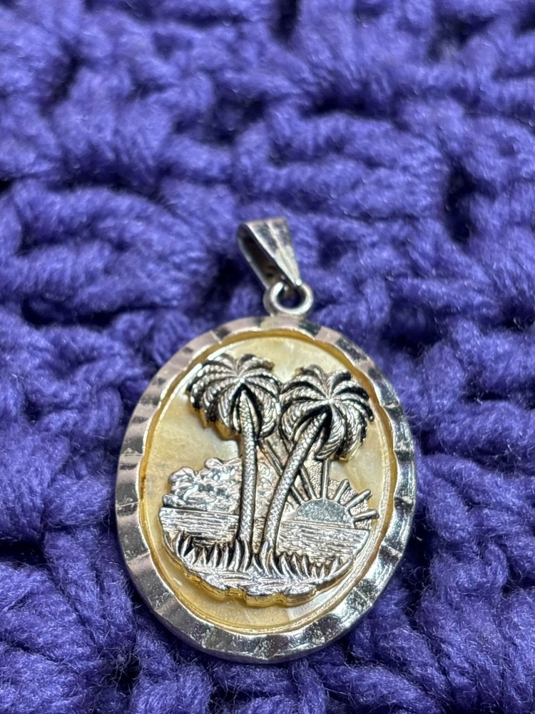 Vintage Goldtone and Plastic Oval Pendant Beach Scene Palm Trees 1.5 inches