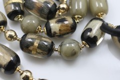 Chico’s Long 43″ double strand black chord animal print faux fur/ hair necklace
