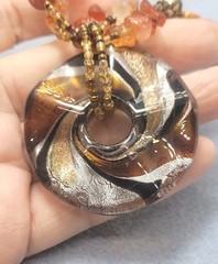 Multi-strand piece amber-toned Glass Gemstone Beads, large round pendant 26in.