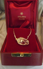 Steuben glass rose bud mounted with a 14kt yellow gold 17″ neck chain
