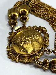 Vintage Ornate Gold-tone Coin attached to 24 dangling tassel Chains Bracelet