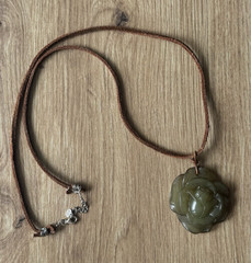 Vintage Tica Rosa Green Carved Stone Flower Pendant Necklace Brown Leather Cord