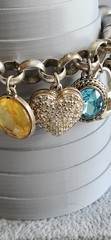 Vintage Avon Multiple Charm Silvertone Stretchable Locket Bracelet 8+