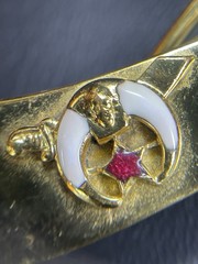 Vintage Gold Tone Scimitar Clip Brooch with Crescent Motif & Red Rhinestone