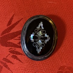 Vintage Taxco sterling silver brooch with abalone shell and dark horn or onyx.