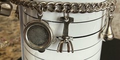 Silver Tone Charm Bracelet W/9 Charms Size 6 3/4”