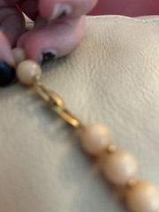 1980s Napier Pale Orange and Cream Lucite with Gold spacers Necklace.