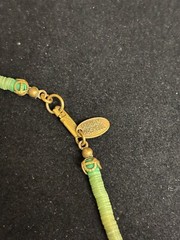 MIRIAM HASKELL UNIQUE GREEN GLASS 22″ NECKLACE WITH GOLD TONE METAL