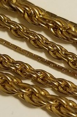 Vintage multi strand cage bead necklace in rich matte goldtone.